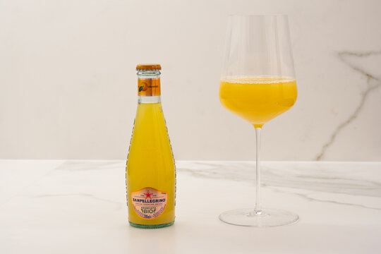 San Pellegrino Terme, Italy - December 27 2020: Aranciata Bio Organic Orange Lemonade made by S. Pellegrino, a Refreshing Soda Pop.
