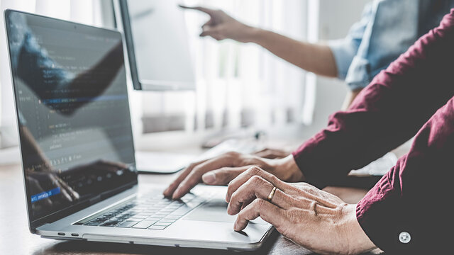 Programmer working in a software development and coding technologies. Website design. Technology concept.