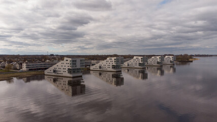 sphinx houses at lake Gooimeer in Huizen, the Netherlands, Aerial