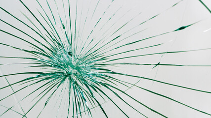 Cracks on the glass on a white background.