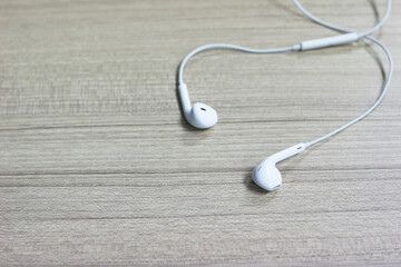 Headphones on wood background, Copy space.