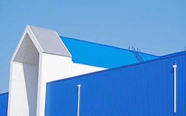 blue roof and walls of a large shopping center