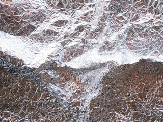 Crumpled foil texture background, aluminum wall , metal