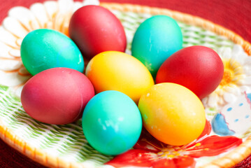 Colorful easter eggs on a plate
