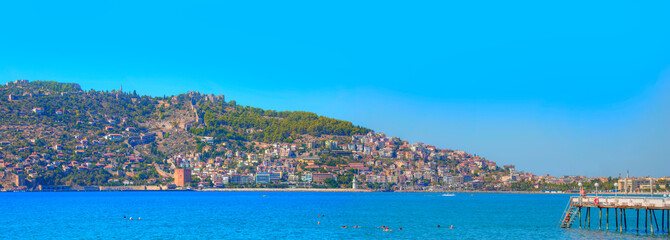 Landscape with marina and Red Tower (Kizil Kule) in Alanya peninsula - Antalya, Turkey