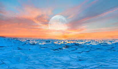 Beautiful winter landscape on frozen seashore with full moon during sunset - Tromso, Norway "Elements of this image furnished by NASA"