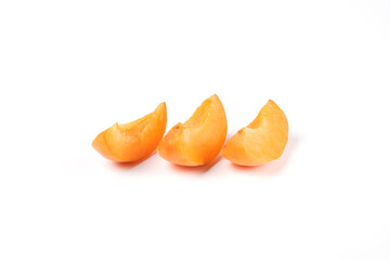 Juicy peach slices isolated on white background 