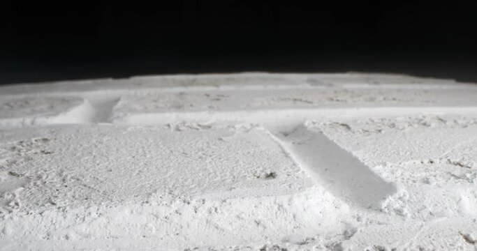 detailed extreme close-up surface of decorative plaster white brick.