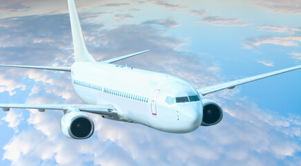 White passenger airplane over the clouds  - Travel by air transport