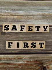 Wooden block letters alphabet "SAFETY FIRST".