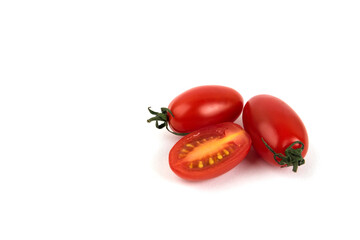 Fresh red seedless tomatoes isolated on white background 