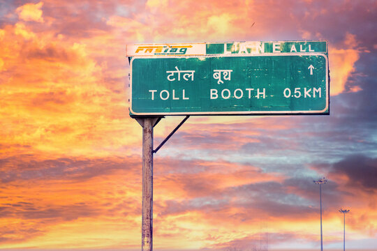 Toll Booth Sign Near A Toll Booth Showing The New Cashless RFID Based FASTag Payment System Made Mandatory By The National Highway Authority Of India NHAI To Speed Payments And Reduce Congestion On