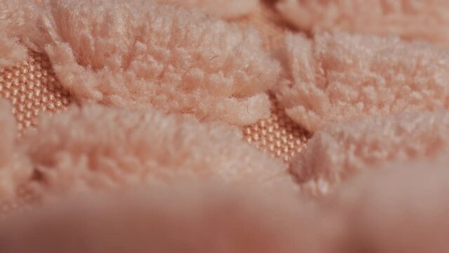 Macro slide shot, fluffy pink fur, plaid