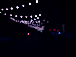 Abstract bokeh background at city street.