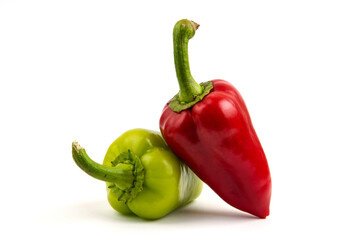 Red and green peppers on whitte background
