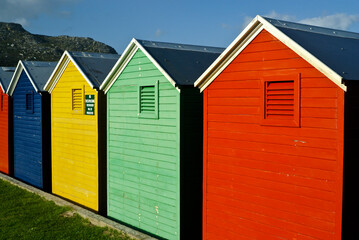 Fototapeta na wymiar Colorful changing houses on the beach, Fish Hoek, Cape Peninsula, South Africa
