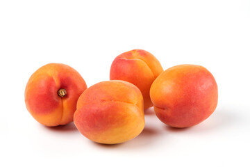 Four peaches isolated on white background zoom