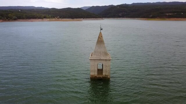 Aerial Panning: Church Tower At Sau Reservoir Near Mountains