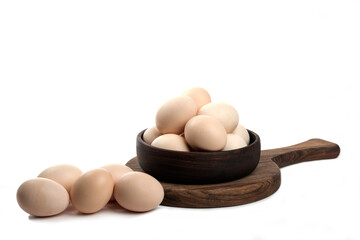 Organic white chicken eggs in wooden bowl on white background