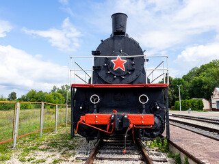 Close up image of locomotive from an old fashioned steam train