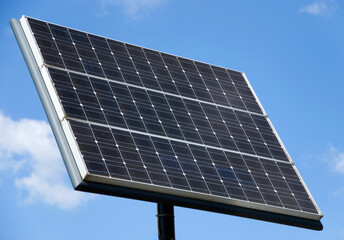 solar panel in front of blue sky