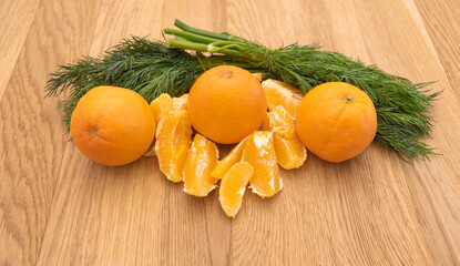 Orange fruits and dill in the back. Health benefits concept