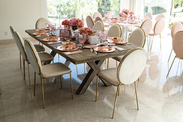 Indoor pre wedding breakfast with beautiful pink and white tones