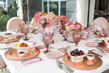 Indoor pre wedding breakfast with beautiful pink and white tones