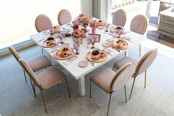 Indoor pre wedding breakfast with beautiful pink and white tones