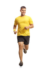 Young man in sportswear running towards camera