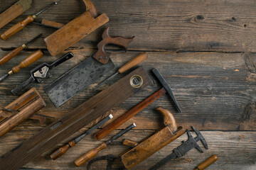 Joinery tools on wood table background with copy space
