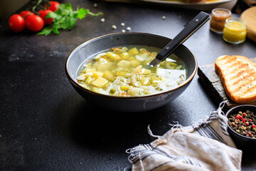 soup vegetable first course meal broth, potatoe, cauliflower, pasta no meat vegetarian or vegan portion on the table snack top view copy space food background