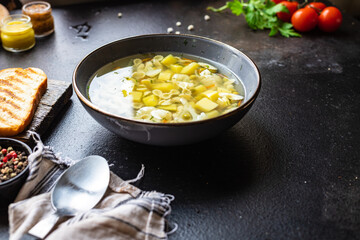 soup vegetable first course meal broth, potatoe, cauliflower, pasta no meat vegetarian or vegan portion on the table snack top view copy space food background