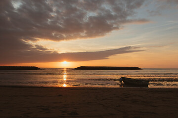 People on the beach enjoying the beautiful sunset in Latin America