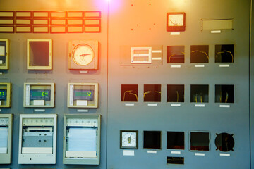 Electric voltage control room. Electricity control panel with buttons and levers at control room of modern plant. Factory industrial concepts.