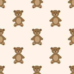 Pattern of a toy in the form of a teddy bear on a light brown background