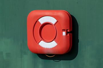 Life boy case  attached to a wall 