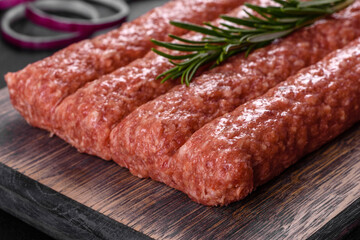 Fresh raw mince for grilled kebab with spices and herbs