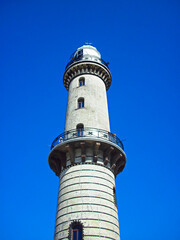 Fototapeta na wymiar Der Leuchtturm an der Ostseeküste in Warnemünde 