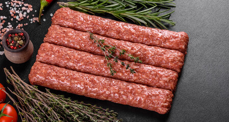 Fresh raw mince for grilled kebab with spices and herbs