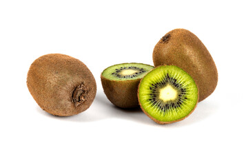 Whole kiwi fruits and half kiwi fruits on a white background