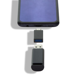 Phone or smartphone with USB OTG data transfer connected to a USB flash drive, read and write any information from portable gedgets