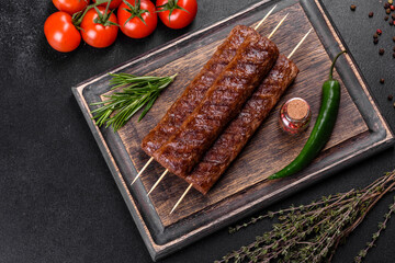 Fresh tasty kebab grilled with spices and herbs