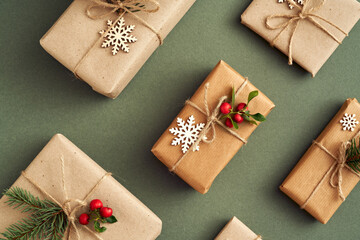 Christmas presents wrapped in ecological recycled paper - zero-waste concept, top view