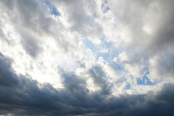 Stormy sky with storm clouns on the sunset with beautiful sun