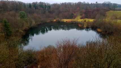 old gravel pit converted into natural reserve in the village of Böxlund in northern germany
