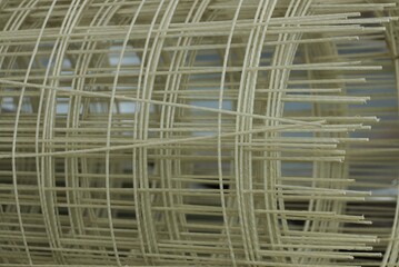 gray brown plastic mesh texture in a roll