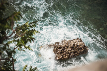 waves crashing on rocks