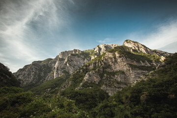 Obraz premium Mysty clouds over the mountain peaks