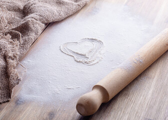 baking ingredients egg, flour, oil for baking on wooden background